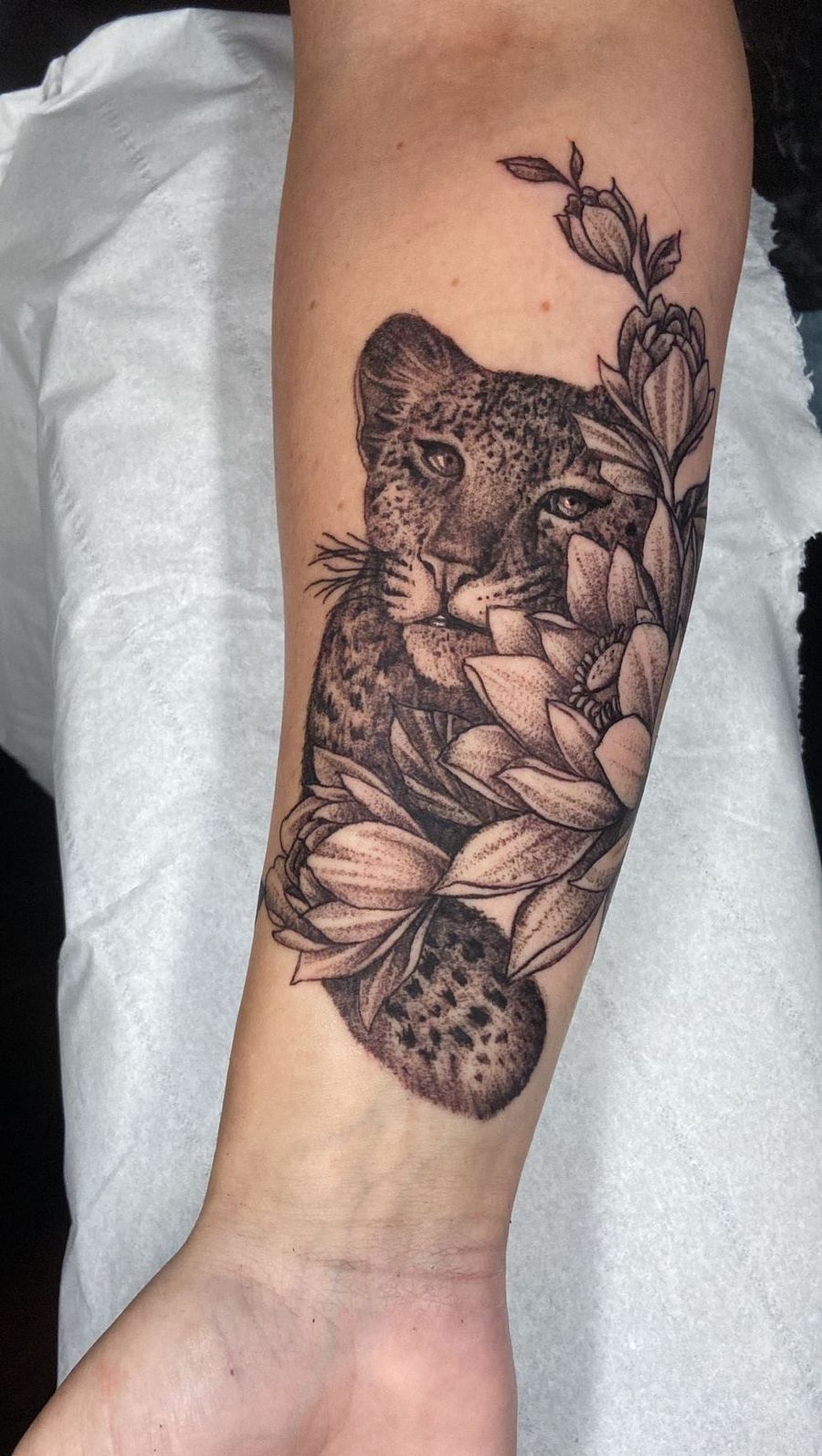 Leopard and floral forearm tattoo by Bex, Treze Ink Coventry
