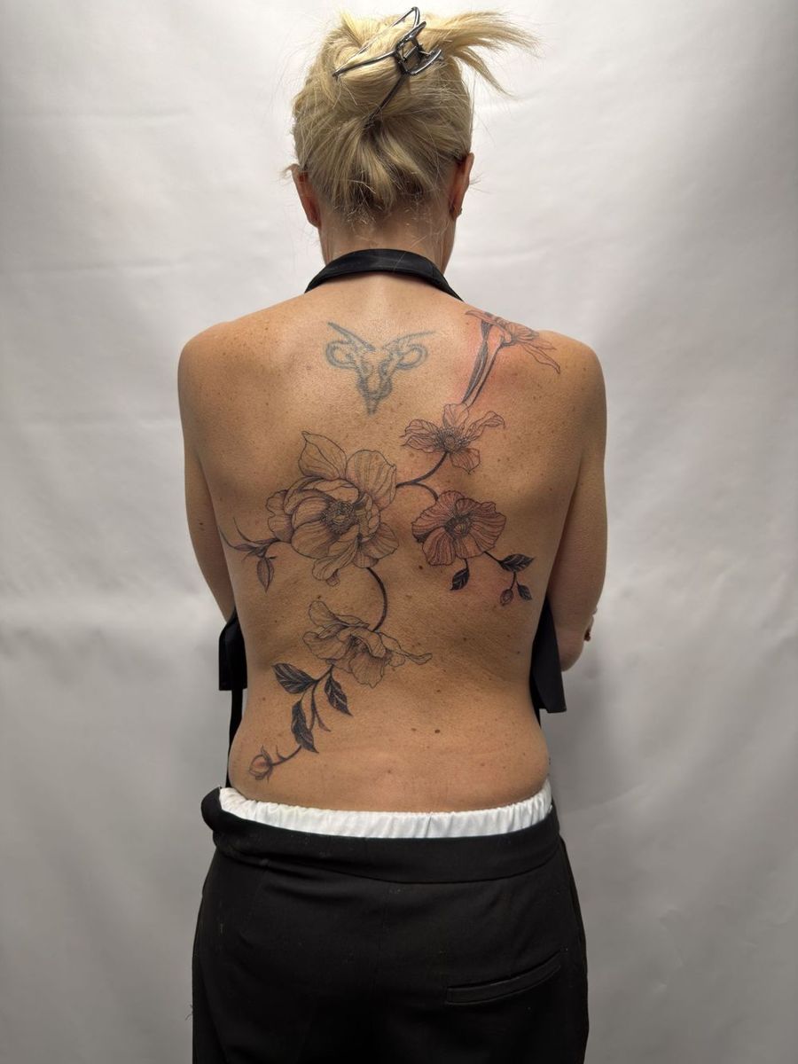 Delicate botanical back piece by Camila Fila, Treze Ink Coventry