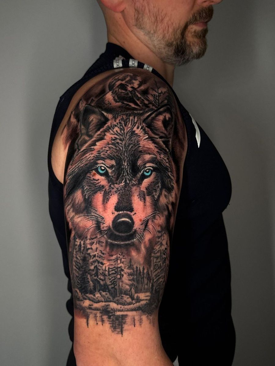 Detailed wolf shoulder tattoo by Paul Cheregi, Treze Ink Coventry