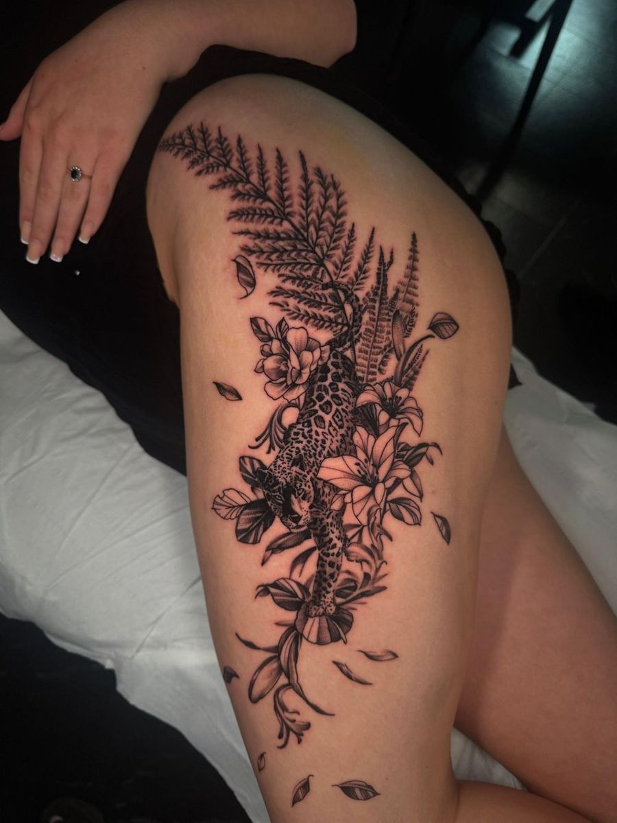 Botanical thigh tattoo by Paul Cheregi, Treze Ink Coventry